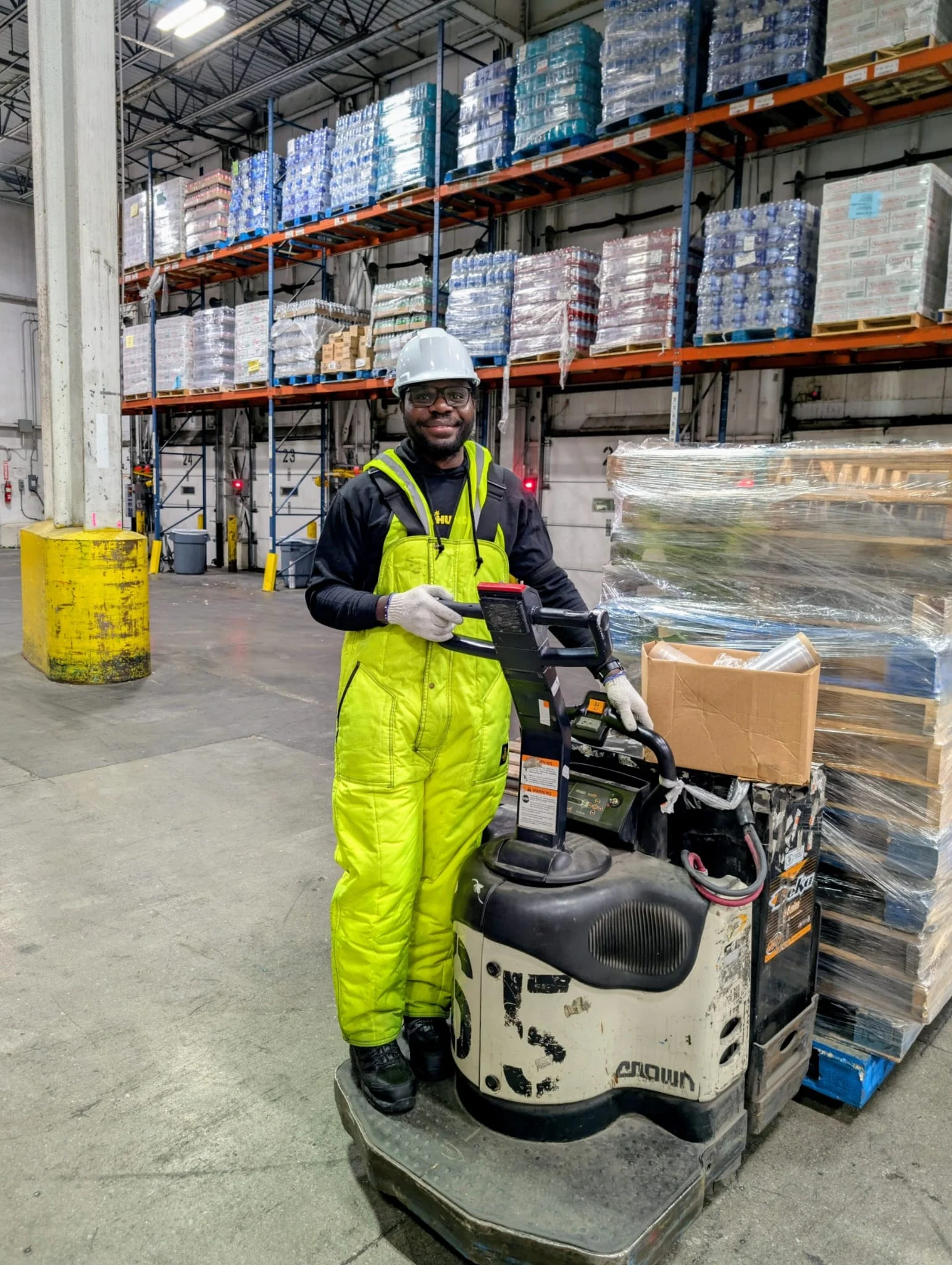 Aiwanfo founder working inside a food distribution warehouse